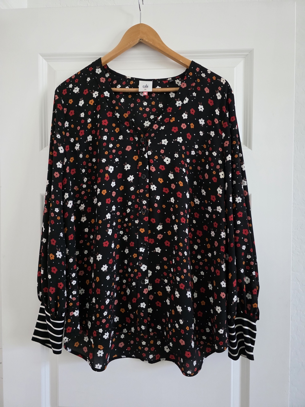 CAbi Black Floral V-Neck Long Sleeve Blouse with Striped Cuffs. Size XL.
